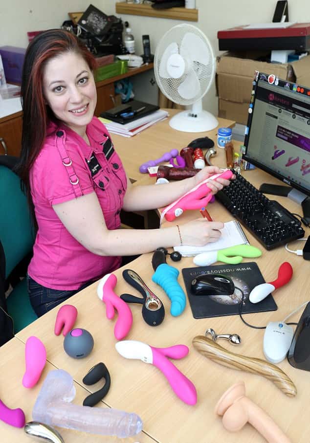 Professional female sex toy reviewer at home
